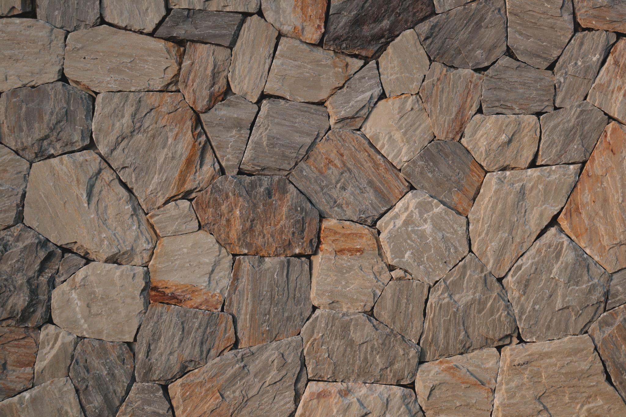Stone textured wall finish